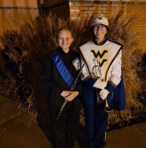 Alexis and her younger sister in band uniforms
